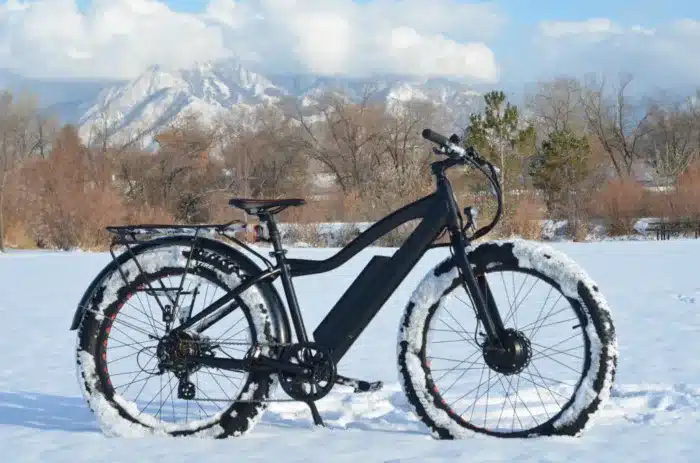 Black E-bike in snow